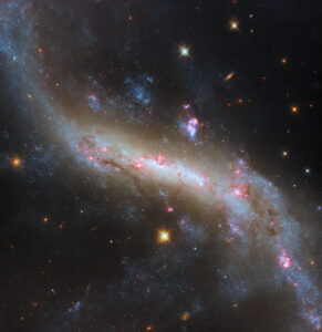 hubble-views-the-lights-of-a-galactic-bar
