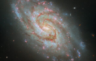 hubble-captures-steller-nurseries-in-a-majestic-spiral