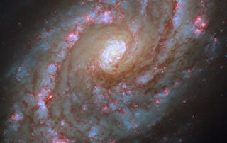 hubble-spots-a-grand-spiral-of-starbursts