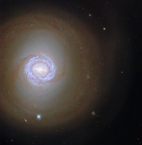 hubble-pinpoints-young-stars-in-spiral-galaxy