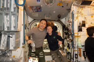 nasa-astronauts-jonny-kim-and-zena-cardman-pose-for-a-portrait-in-the-unity-module
