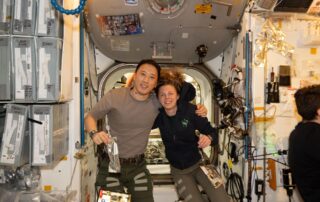 nasa-astronauts-jonny-kim-and-zena-cardman-pose-for-a-portrait-in-the-unity-module