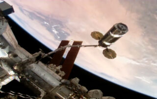 robotic-arm-maneuvering-cygnus-for-station-installation