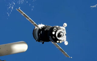 three-new-crew-members-aboard-soyuz-dock-to-station