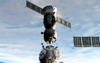 soyuz-undocks-from-station,-crew-heads-for-earth-return