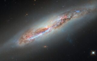 hubble-glimpses-galactic-gas-making-a-getaway