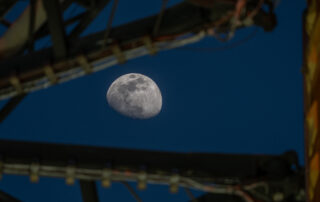 Moon Seen Shining on Full Artemis II Stack at Launch Pad 39B