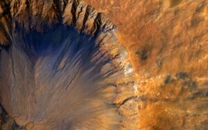 celebrating-nasa’s-mars-reconnaissance-orbiter’s-20th-anniversary:-crater-near-sirenum-fossae