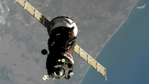 soyuz-docks-to-station,-hatches-open-soon-for-crew-greeting