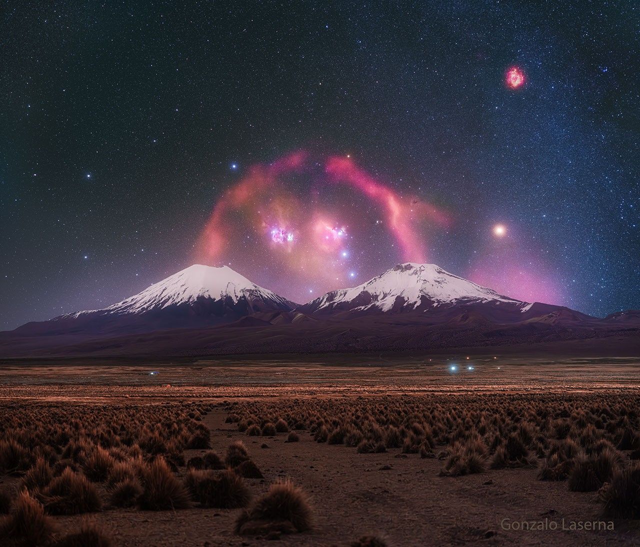 apod:-2026-july-28-–-barnards-loop-over-twin-volcanoes