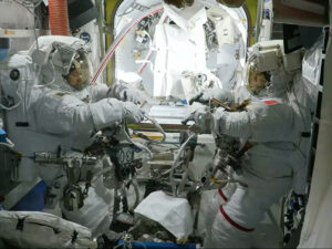 esa,-nasa-astronauts-suit-up-for-navigation,-science-maintenance-spacewalk